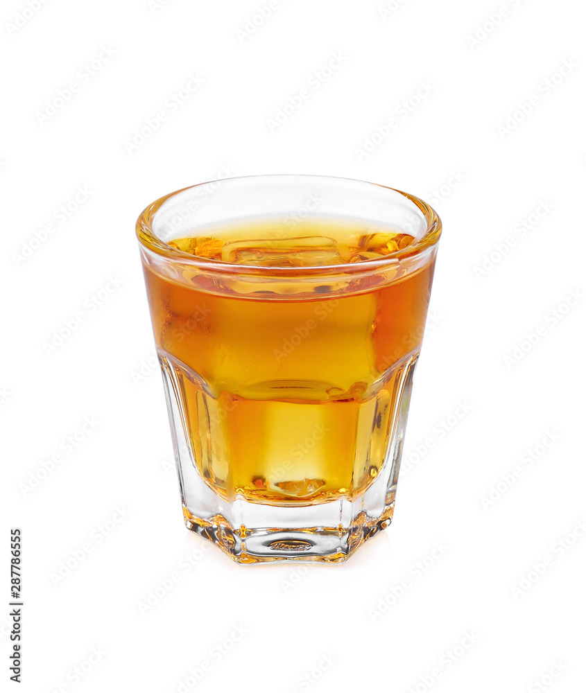 Glass of scotch whiskey and ice on  white background