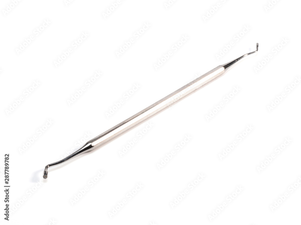 Dental tools on white background with copy space Dental tools on white background with copy space