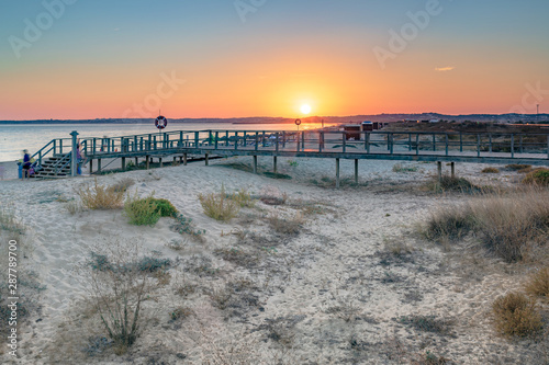 Sunset at the Algarve beach Praia Alvor between Lagos and Portimao