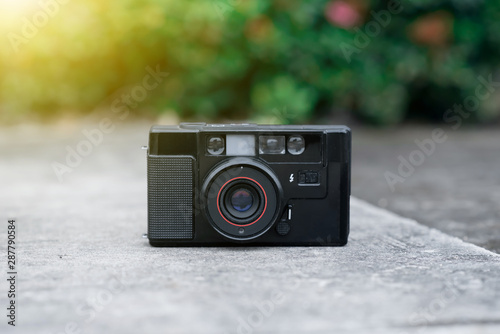 a film camera in the grass