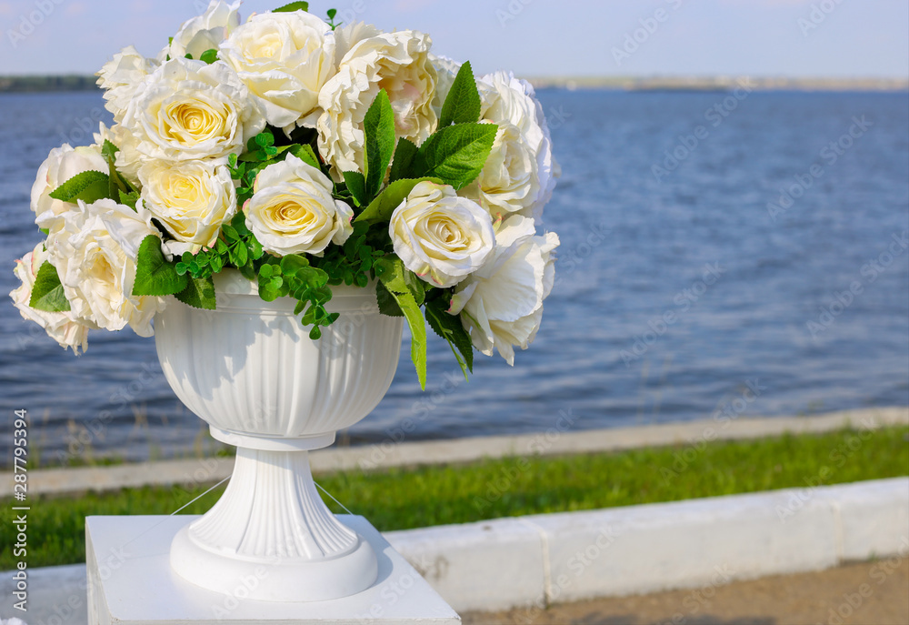 Obraz premium wedding decorations. Roses on the river background