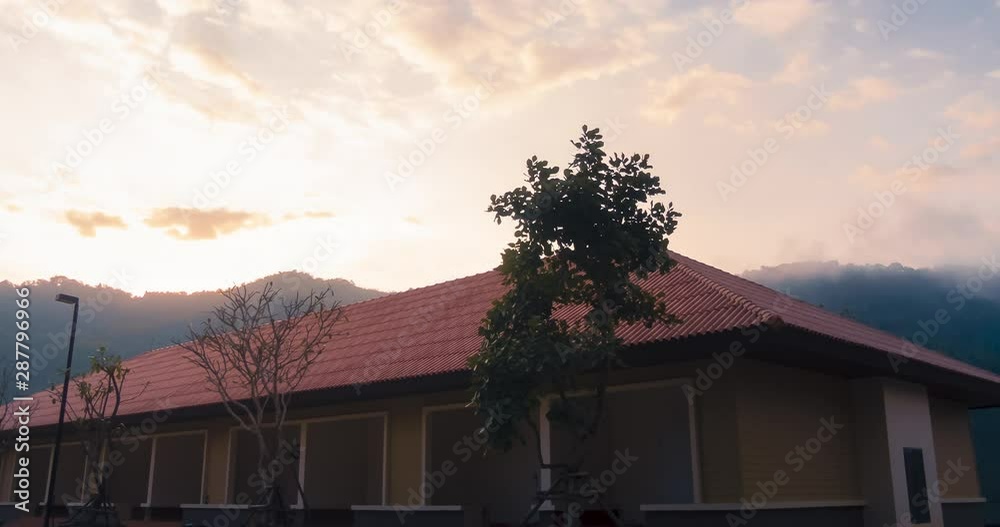 Time lapse modern town house with mountains for living in the fresh air area outside suburbs.Rental houses for tourists for holiday.The concept of Real Estate business. Time lapse modern town house with mountains for living in the fresh air area outside suburbs.Rental houses for tourists for holiday.The concept of Real Estate business.