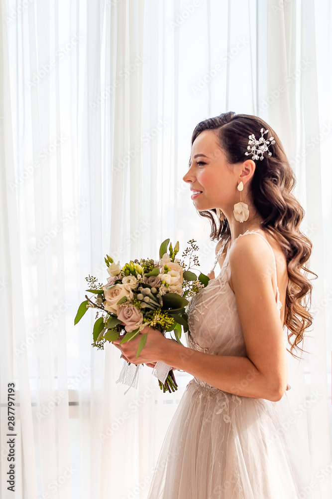 Wedding day. Portrait of beautiful bride with bouquet Wedding day. Portrait of beautiful bride with bouquet