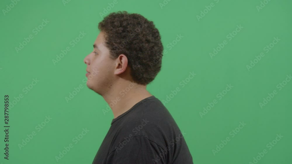 Young Boy Lateral Shot Screaming Hard In A Deep State Of Frenzy Young Boy Lateral Shot Screaming Hard In A Deep State Of Frenzy