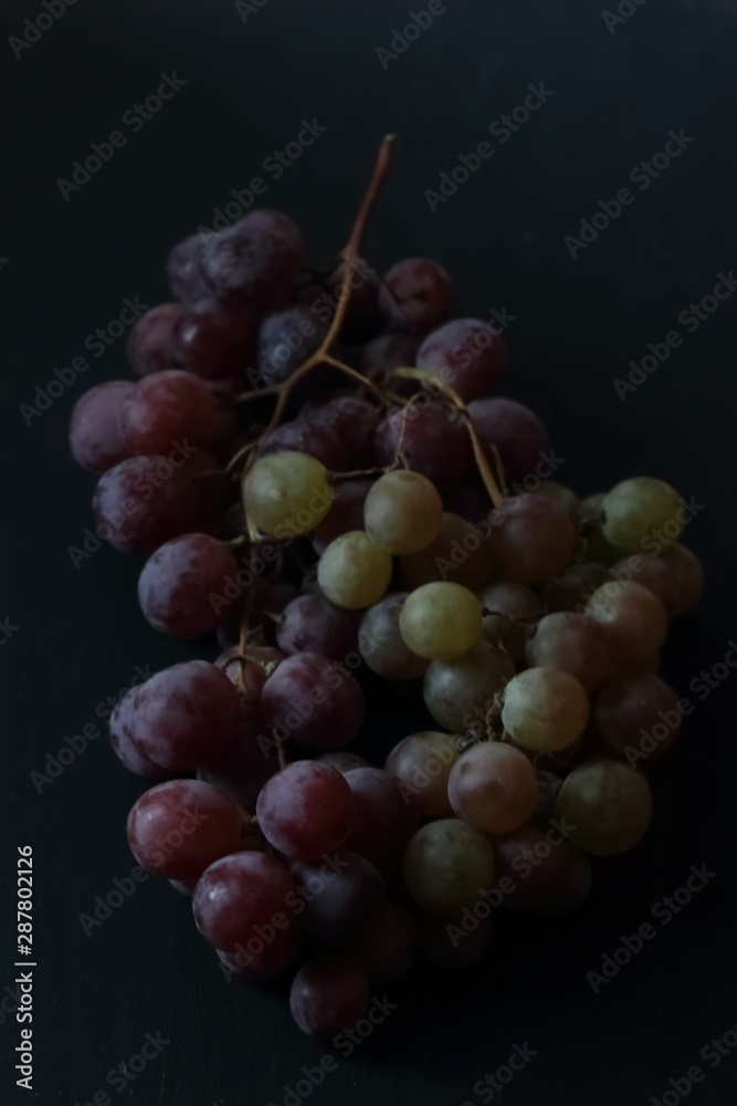Grape fruits on a black background Grape fruits on a black background