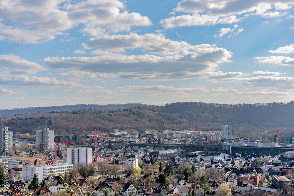 Fototapeta premium Cityscape of Brugg West with industry and the dam. Aerial panoramic view.