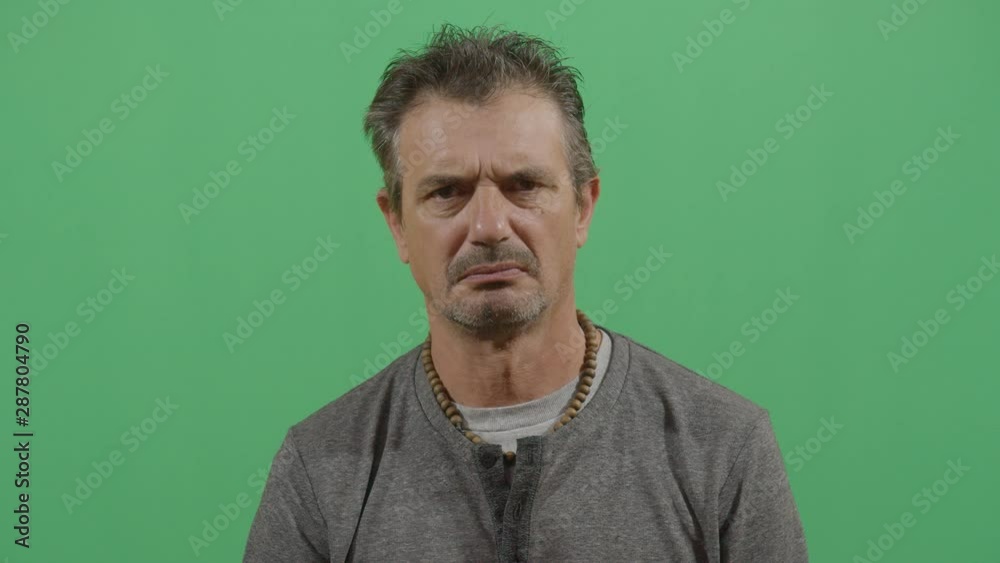 Facial Expression Of A Adult Man Showing Disgust After Sensing A Bad Taste Of Something Imaginary Facial Expression Of A Adult Man Showing Disgust After Sensing A Bad Taste Of Something Imaginary