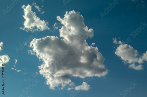 The beautiful shape of clouds on the bright blue sky, sky and clouds background.