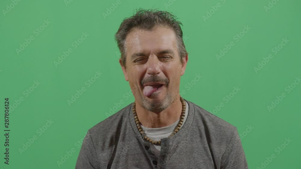 Tongue Sticking And Winking By A Adult Man Starting From A Calm State And Going Unpredictable Tongue Sticking And Winking By A Adult Man Starting From A Calm State And Going Unpredictable