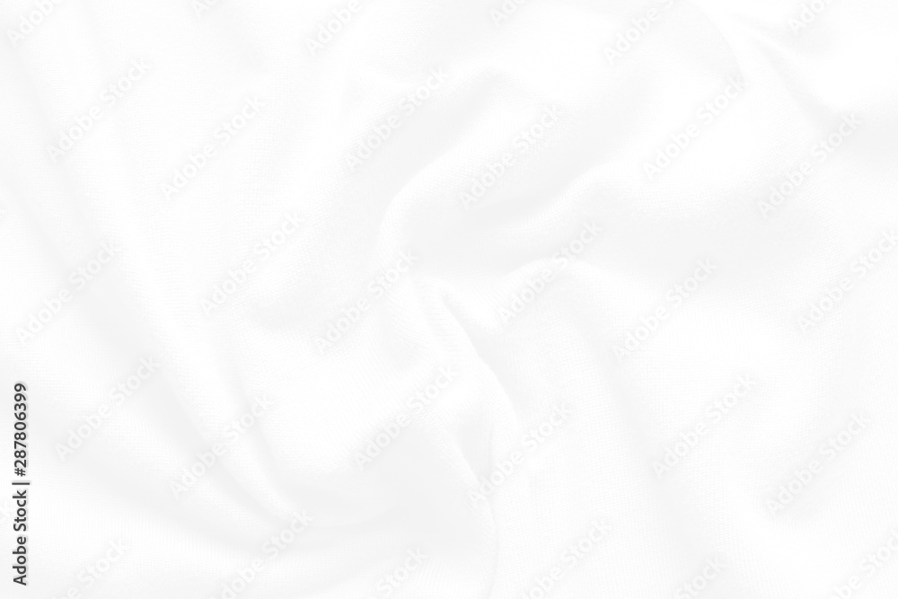 White cloth background abstract. Fabric is wrinkled and sofe wave. Material are used in textile assembly. White cloth background abstract. Fabric is wrinkled and sofe wave. Material are used in textile assembly.