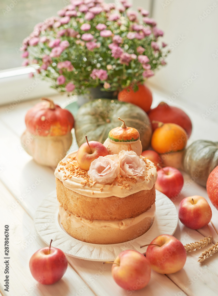 Naked Cake with Apples. Thanksgiving Day table. Happy Halloween Pumpkins, apples and flowers. Bright autumn background. Colorful autumn card. Autumn flower arrangement. Autumn bouquet Naked Cake with Apples. Thanksgiving Day table. Happy Halloween Pumpkins, apples and flowers. Bright autumn background. Colorful autumn card. Autumn flower arrangement. Autumn bouquet
