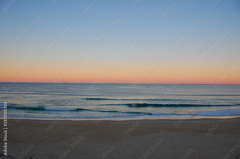 sunset over a lonesome beach