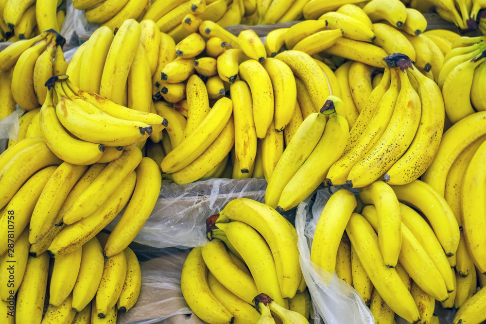 ripe bananas on the counter selling fruit