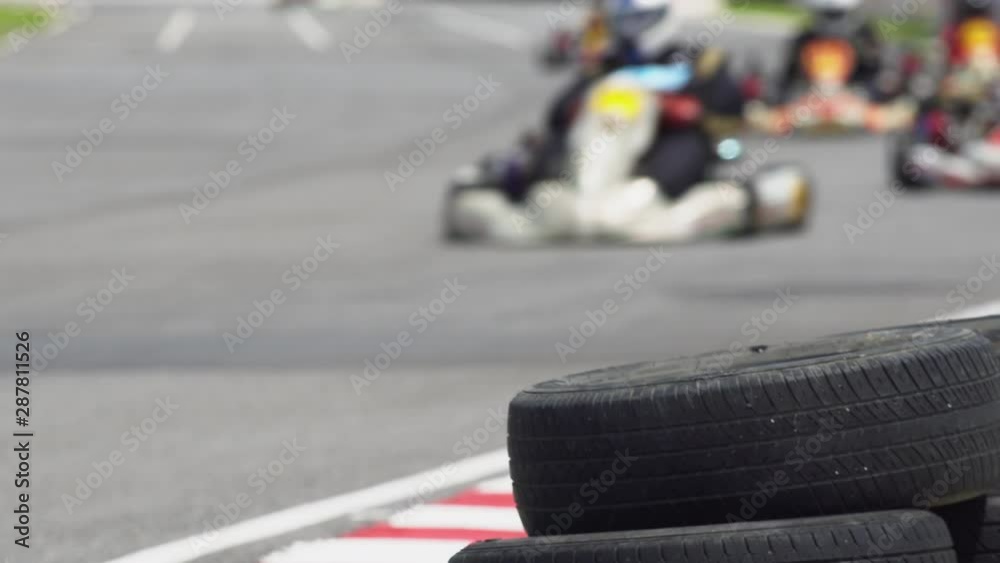 Go Karts racing increase speed in race track