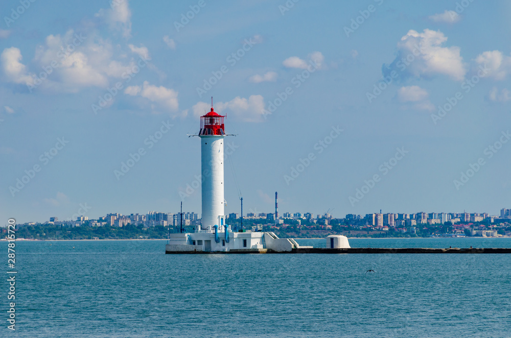 Seascape with lighthouse on the Black Sea in Odesa during the summer season