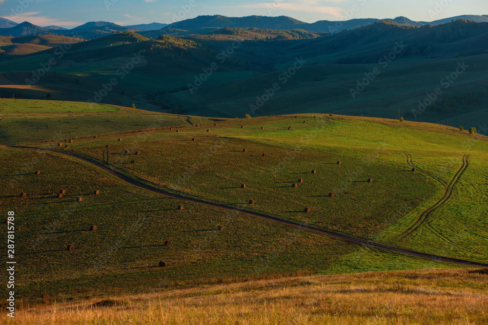 Beauty summer evening in the mountains in Altay, panoramic picture Beauty summer evening in the mountains in Altay, panoramic picture
