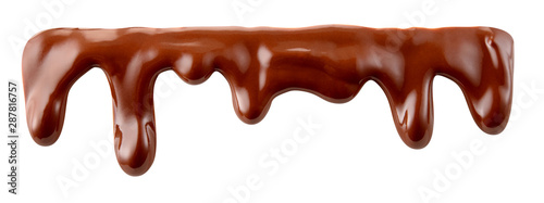 Melted chocolate syrup is dripping. Chocolate streams with drops isolated on white. With clipping path.