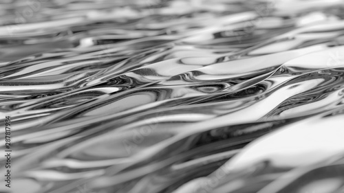 Silver background. Aluminum surface. Ornate modern chrome shape