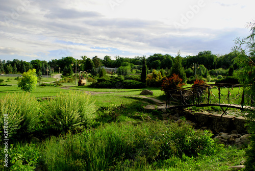 The spring countryside  bridge and small pond
