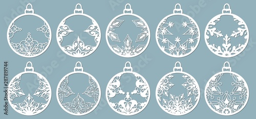 Christmas balls set with a snowflake cut out of paper. Templates for laser cutting  plotter cutting or printing. Festive background.