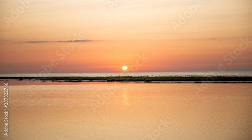 Sunrise on the beach © Mads
