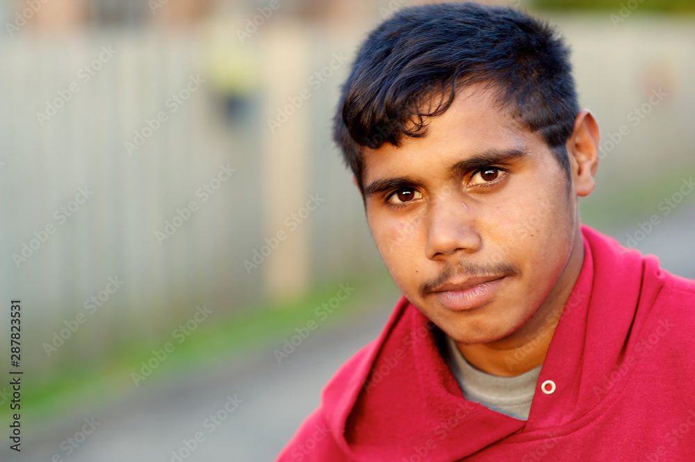 Portrait of teenager in red hoodie Portrait of teenager in red hoodie