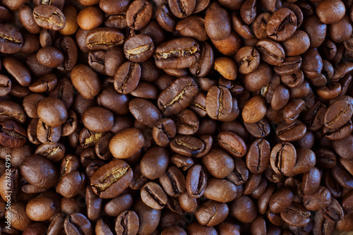 Roasted coffee beans background. Organic coffee. Close Up. © Syrtseva Tatiana