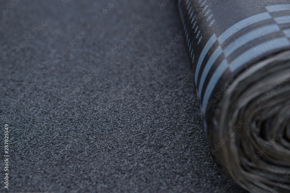 Waterproof bitumen insulation material background texture, closeup Stock  Photo
