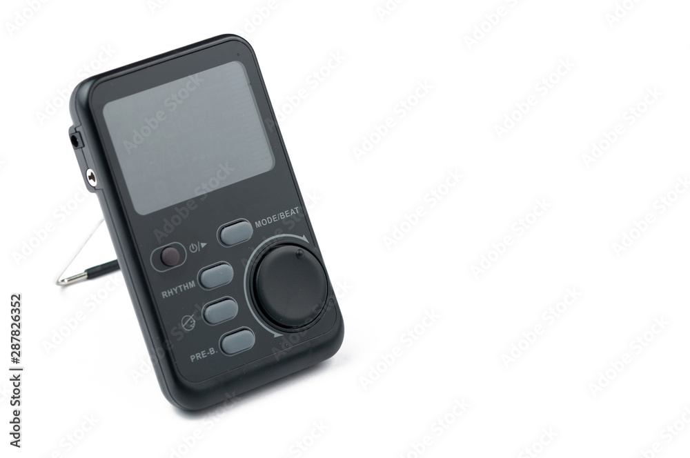 Metronome isolated on white background.Copy space Metronome isolated on white background.Copy space