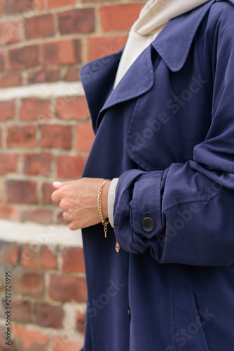 Close up of woman in blue coat