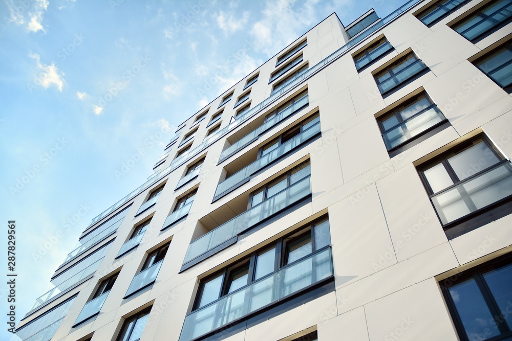 Modern and new apartment building. Multistoried modern, new and stylish living block of flats.