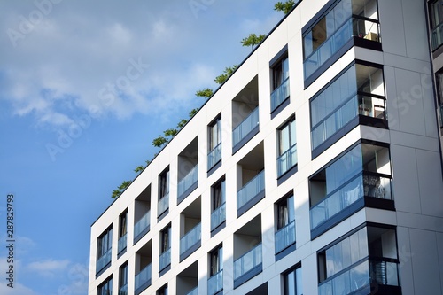 Modern and new apartment building. Multistoried modern, new and stylish living block of flats.