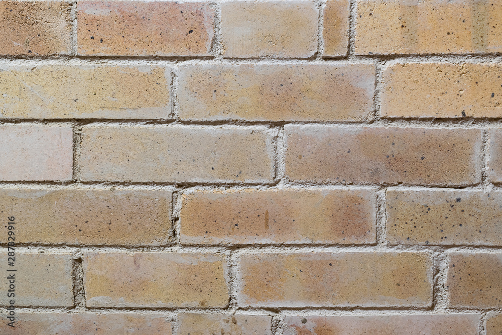 Obraz premium Light brown brick wall as background