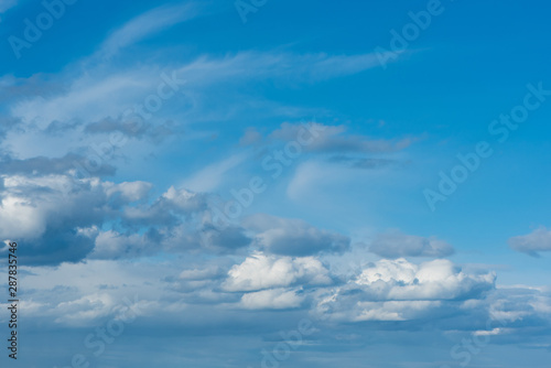 Beautiful Blue Sky with white Clouds. A Nature backgrounds.