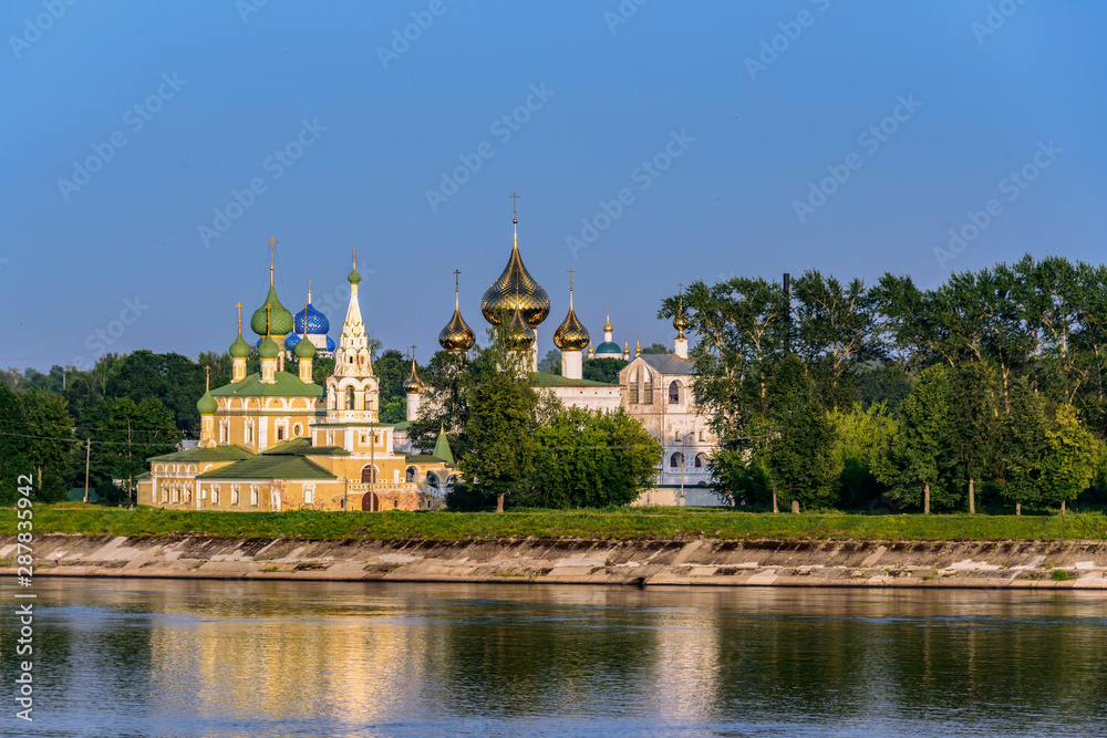 The view of the Resurrection Cathedral and the Cathedral of St. John the Baptist from the Volga river in the ancient town of Uglich, Yaroslavl region, Russia