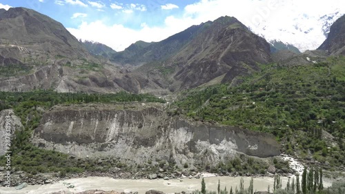 Karimabad Hunza Valley and Breathtaking Picturesque Panoramic View of the Snow Capped Diran and Rakaposhi Mountains at Background photo