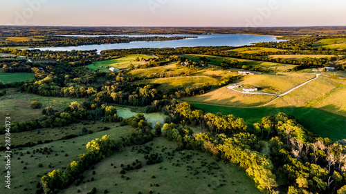 Nebraska drone landscape photography of the countryside and ranch with trees and water