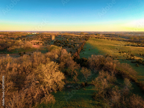 Nebraska countryside landscape trees  water  and sky with clouds