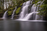 Low level view with a super long exposure shot of waterfall, in the Brecon Beacons, Wales scenic waterfall with flowing water