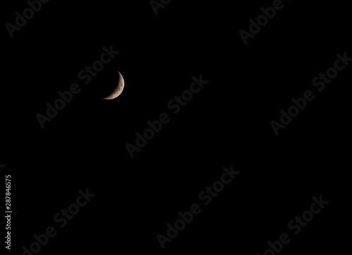 ash moon against night sky in the fall