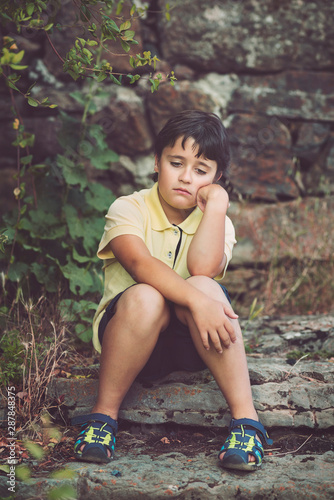 Portrait of sad little boy
