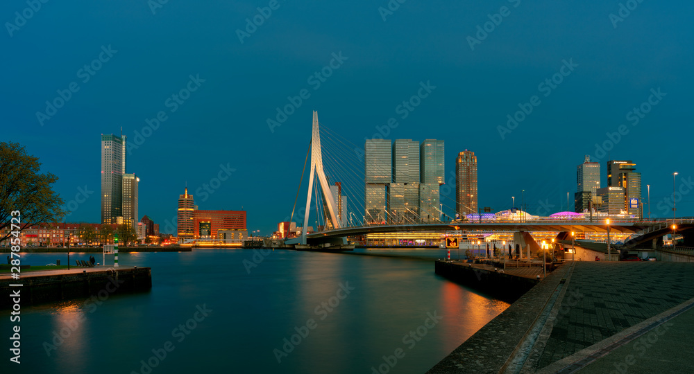 Cityscape of Rotterdam at night, Erasmus Bridge.