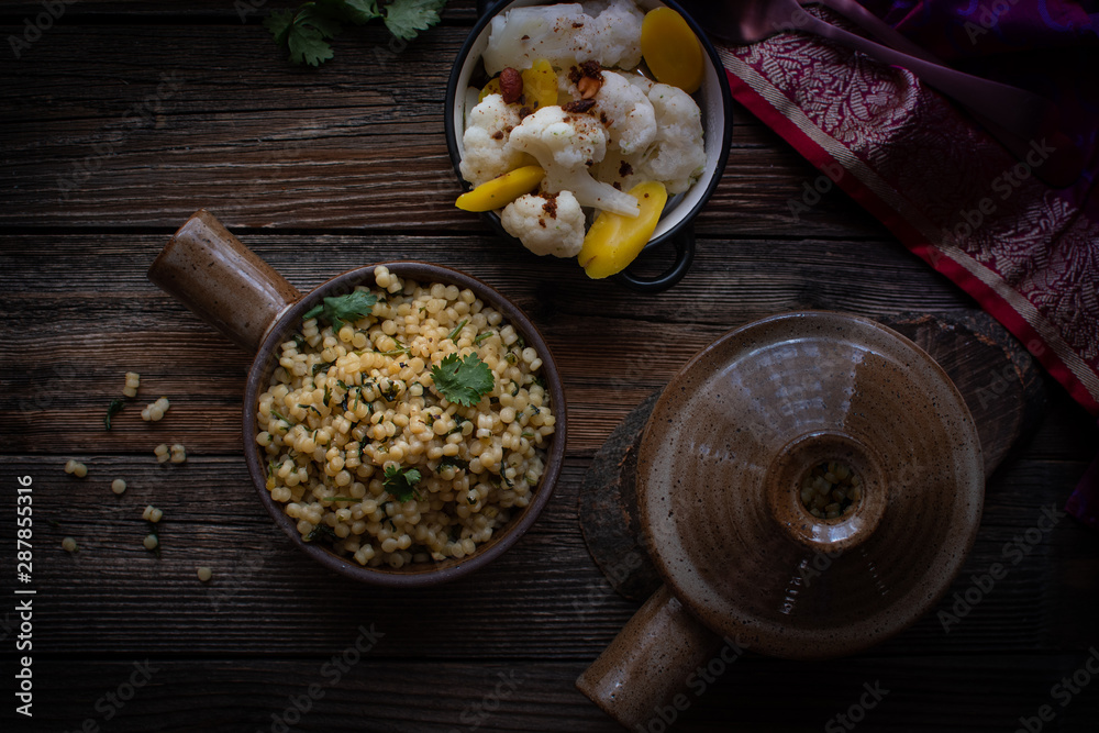 Middle Eastern Couscous and Steamed Vegetables in a Rustic Setting Middle Eastern Couscous and Steamed Vegetables in a Rustic Setting
