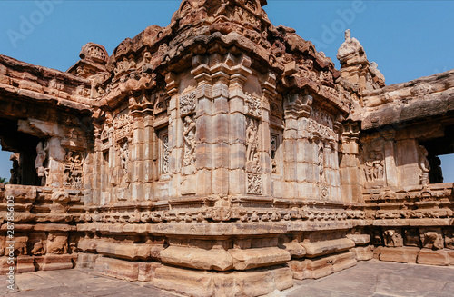 Fantastic carvings on facade of Hindu temple, sacred architecture of Pattadakal, India. UNESCO World Heritage site with traditional temples of 7th and 8th-century