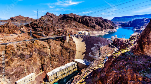 View of the Hoover Dam, a concrete arch dam in the Black Canyon of the Colorado River, on the border between Nevada and Arizona. Viewed from the Mike O'Callaghan–Pat Tillman Memorial Bridge