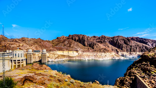 Low water level in Lake Mead and the Intake Towers that supply the water from Lake Mead to the Powerplant Turbines of the Hoover Dam. A hydroelectric power station on the border of Nevada and Arizona