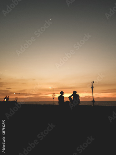 couple backlight at sunset in Cartagena Colombia 