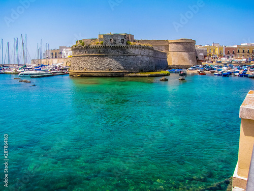 View of the port and the Castle in Gallipoli, Italy photo