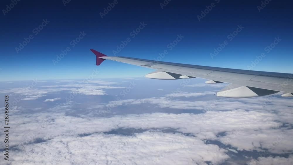 Airplane wing as seen from the passenger's seat. Airplane wing as seen from the passenger's seat.