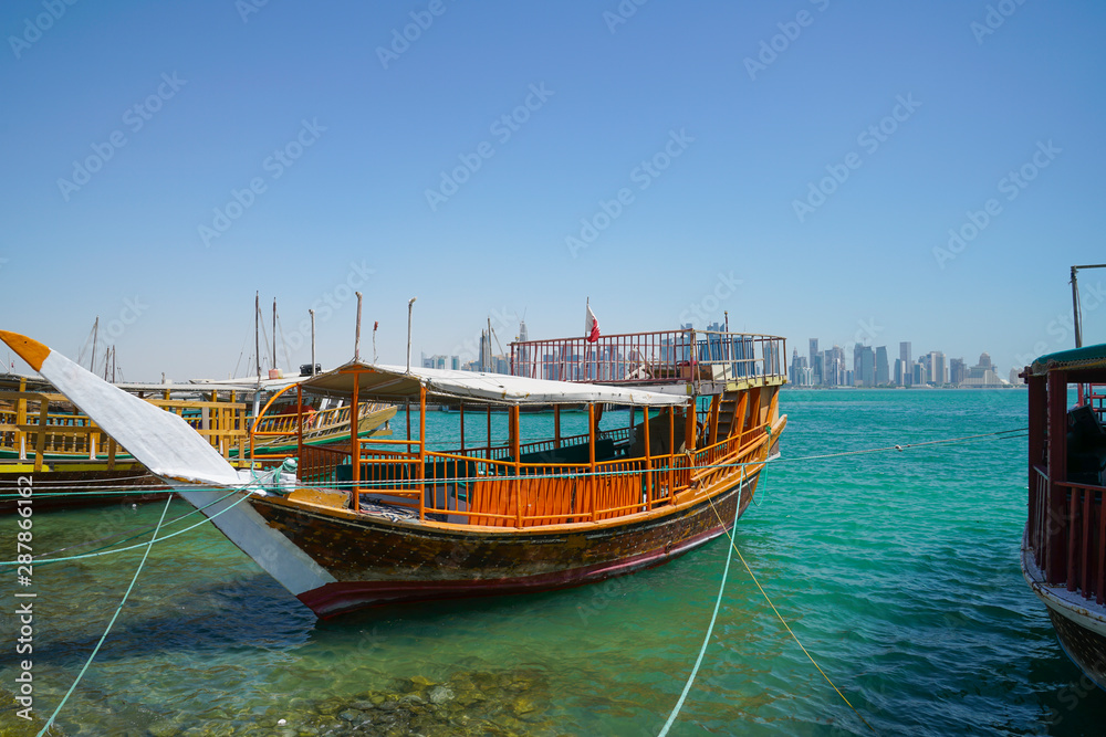 Dhow traditional style design moored along Doha Old Town waterfront